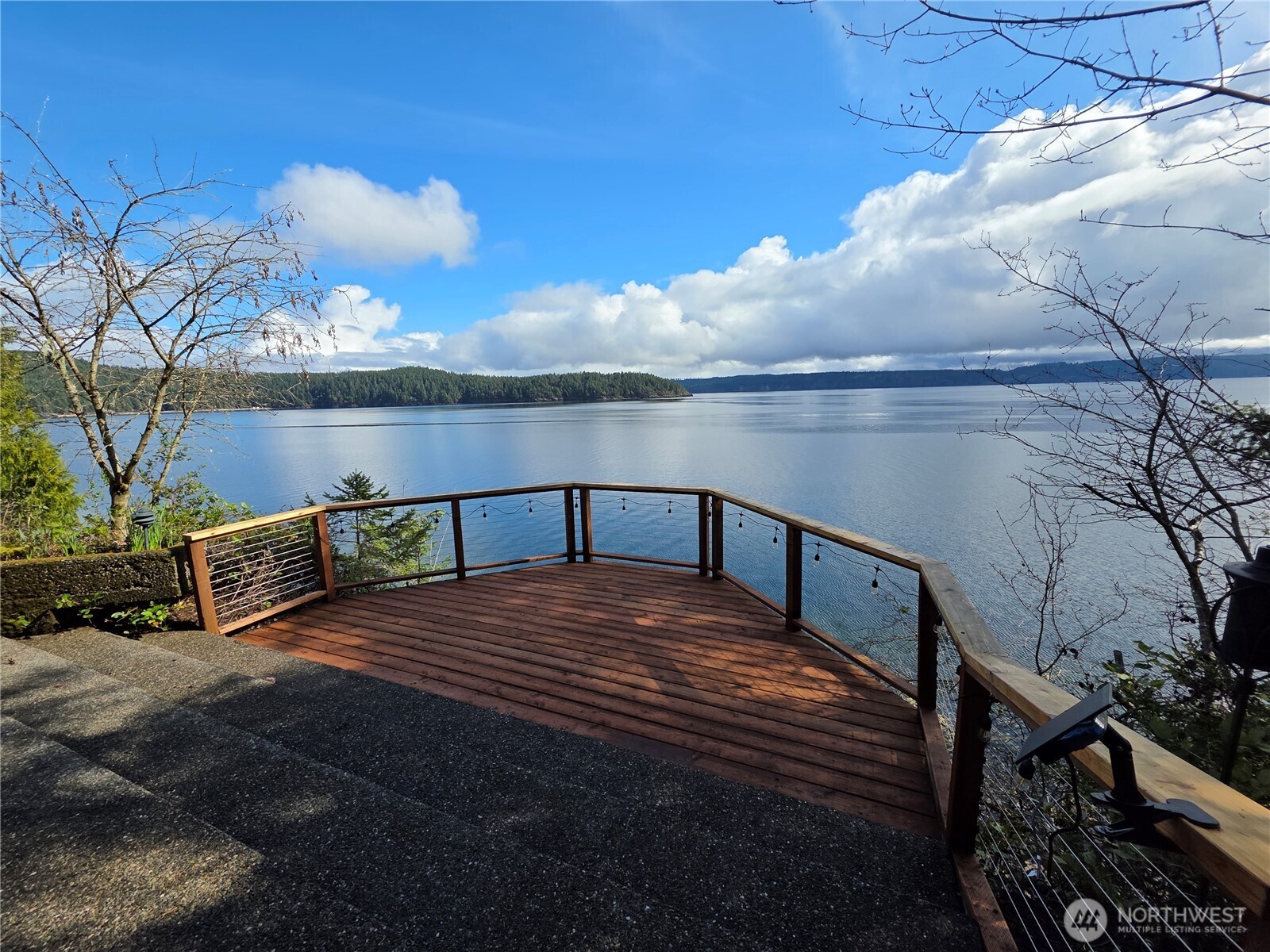 81 Wawa Point Place Brinnon, WA 98320 - Photo 3 of 37 a view of a lake from a balcony