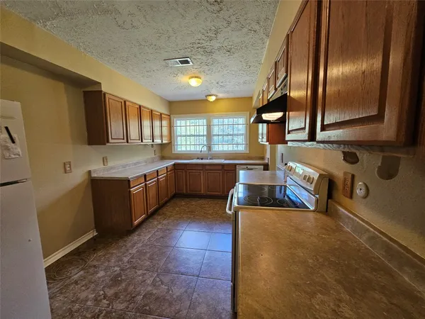 $295,000 | 14906 Quaking Aspen Drive, Tomball, TX 77377