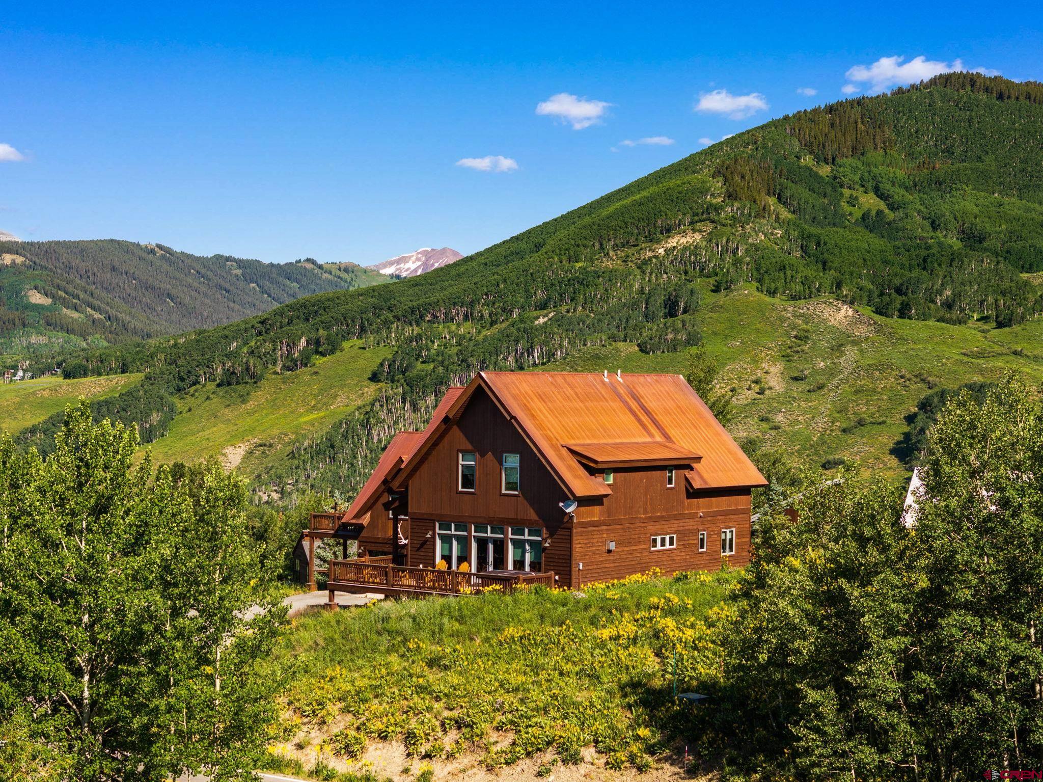 32 Cinnamon Mountain Road Crested Butte, CO 81225 - Photo 42 of 44 a aerial view of a house with a yard