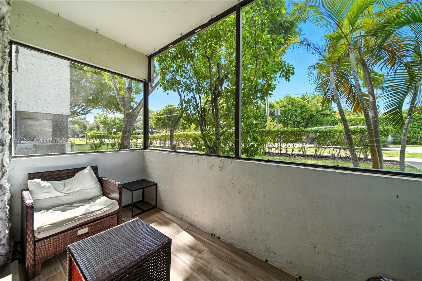 8701 Southwest 141st Street, Unit B1 Miami, FL 33176 - Photo 11 of 22 a view of a two chair in the balcony