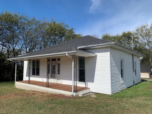 208 Cortner Mill Road Normandy, TN 37360 - Photo 2 of 9 a view of a white house with a yard