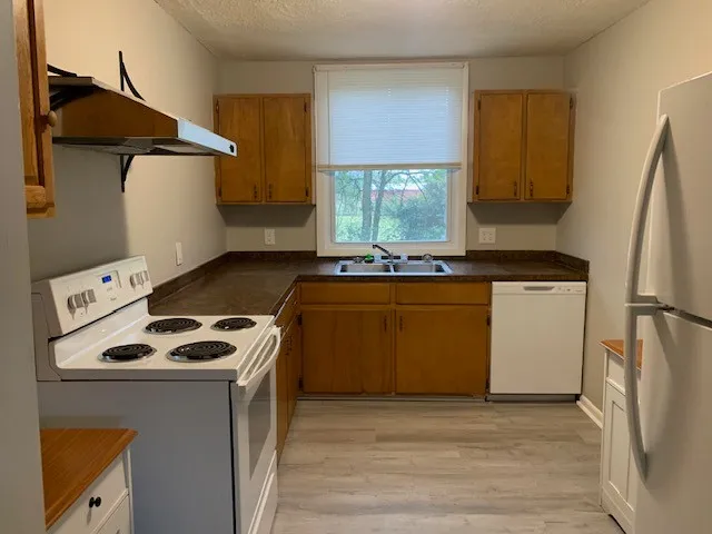 a utility room with washer and dryer
