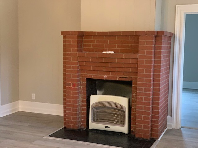 208 Cortner Mill Road Normandy, TN 37360 - Photo 6 of 9 a view of fireplace and wooden floor