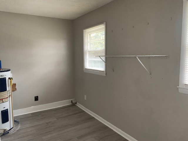 208 Cortner Mill Road Normandy, TN 37360 - Photo 8 of 9 a view of an empty room with wooden floor and a window