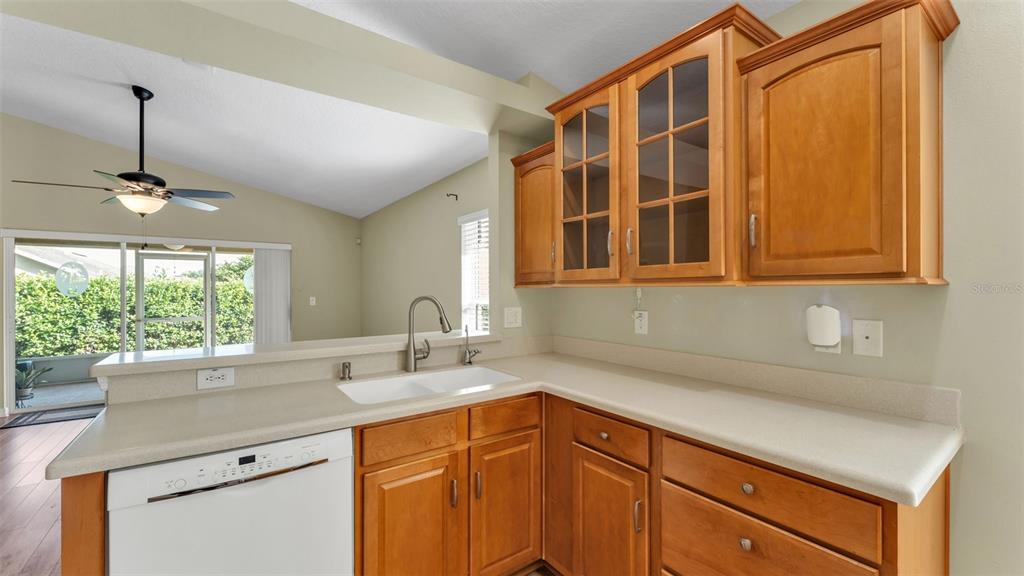 3588 Raleigh Drive Winter Haven, FL 33884 - Photo 17 of 40 a kitchen with a sink and a window
