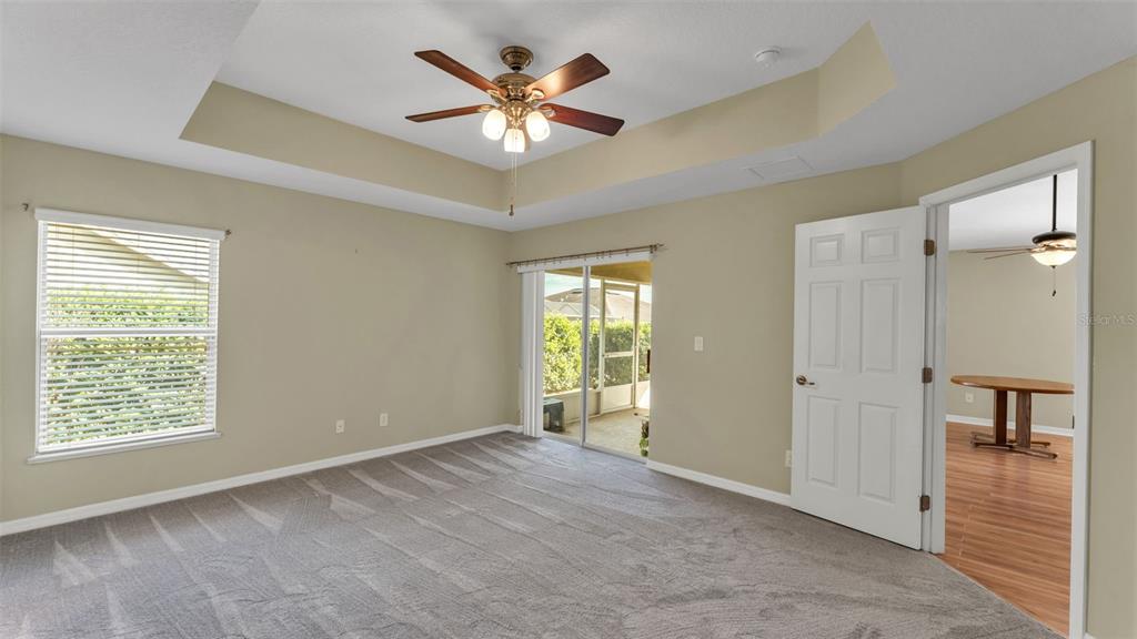 3588 Raleigh Drive Winter Haven, FL 33884 - Photo 20 of 40 wooden floor in an empty room with a window