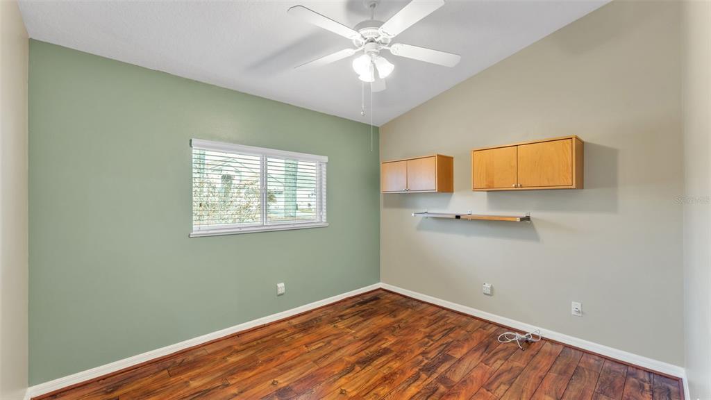 3588 Raleigh Drive Winter Haven, FL 33884 - Photo 28 of 40 a view of room with window and ceiling fan