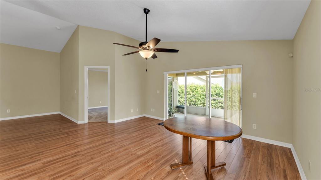 3588 Raleigh Drive Winter Haven, FL 33884 - Photo 9 of 40 a view of a room with furniture window and wooden floor
