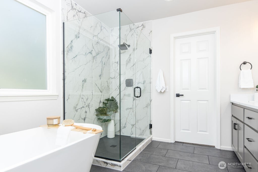 1065 Southwest 12th Street North Bend, WA 98045 - Photo 15 of 27 a bathroom with a tub and shower
