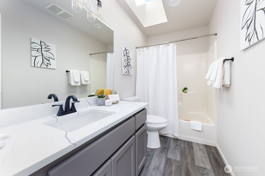 1065 Southwest 12th Street North Bend, WA 98045 - Photo 20 of 27 a bathroom with a sink a toilet and shower