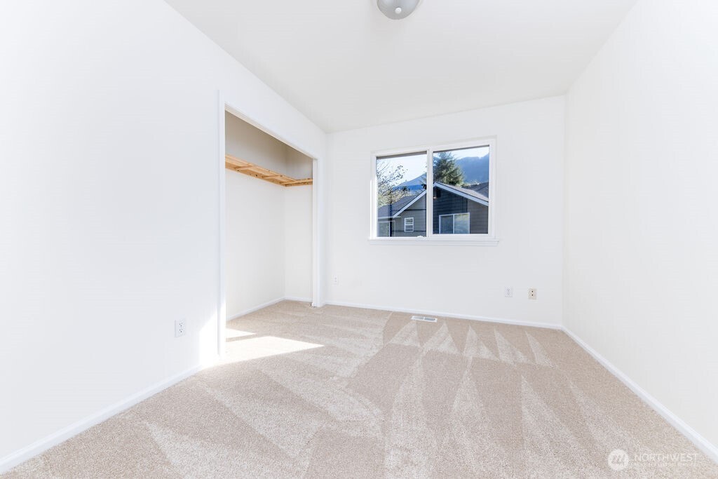 1065 Southwest 12th Street North Bend, WA 98045 - Photo 22 of 27 an empty room with windows