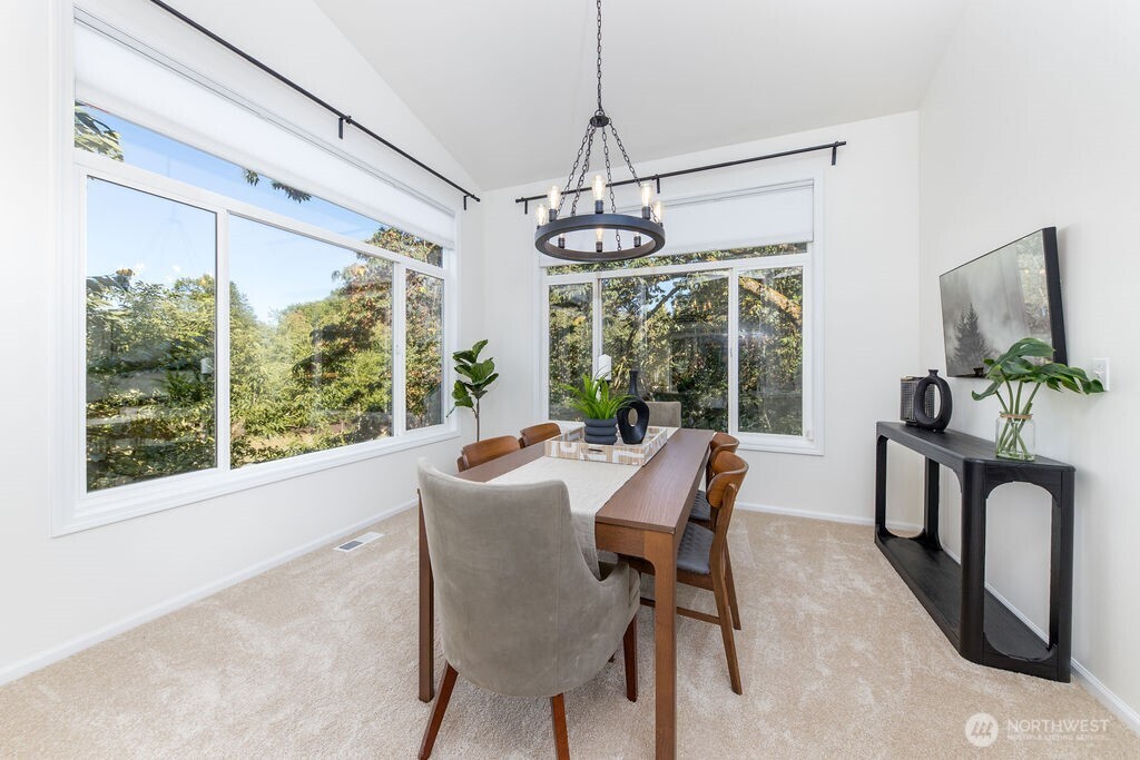1065 Southwest 12th Street North Bend, WA 98045 - Photo 5 of 27 a view of a dining room with furniture window and outside view