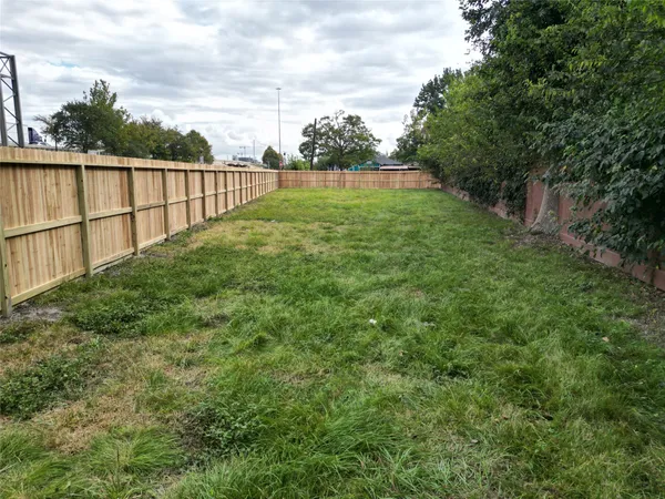 a view of a backyard with a garden