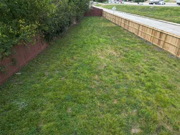 a view of a garden with a bench