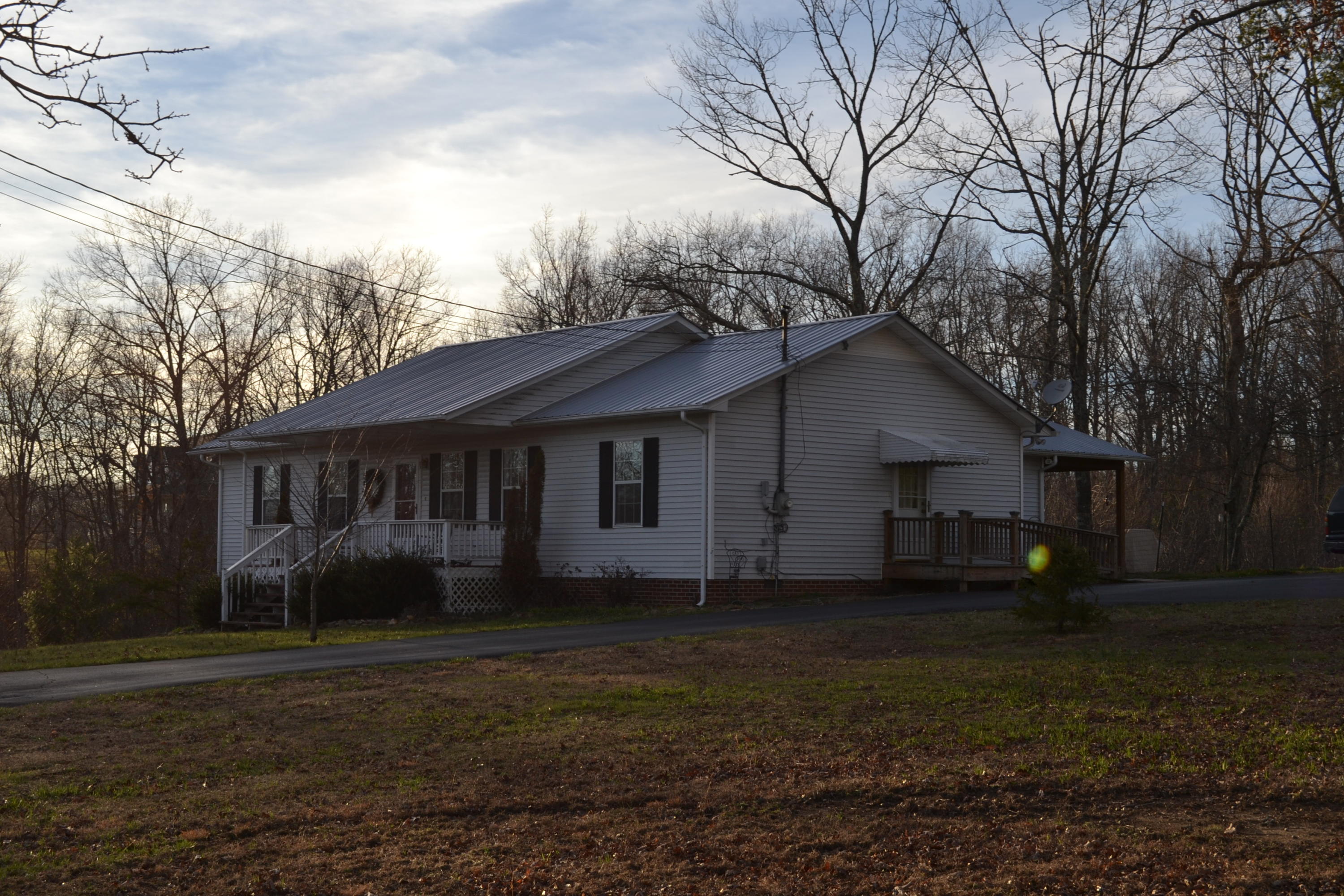 1009 Obed River Road Crossville, TN 38555 - Photo 3 of 24 3 Front, side entrance to bonus.JPG