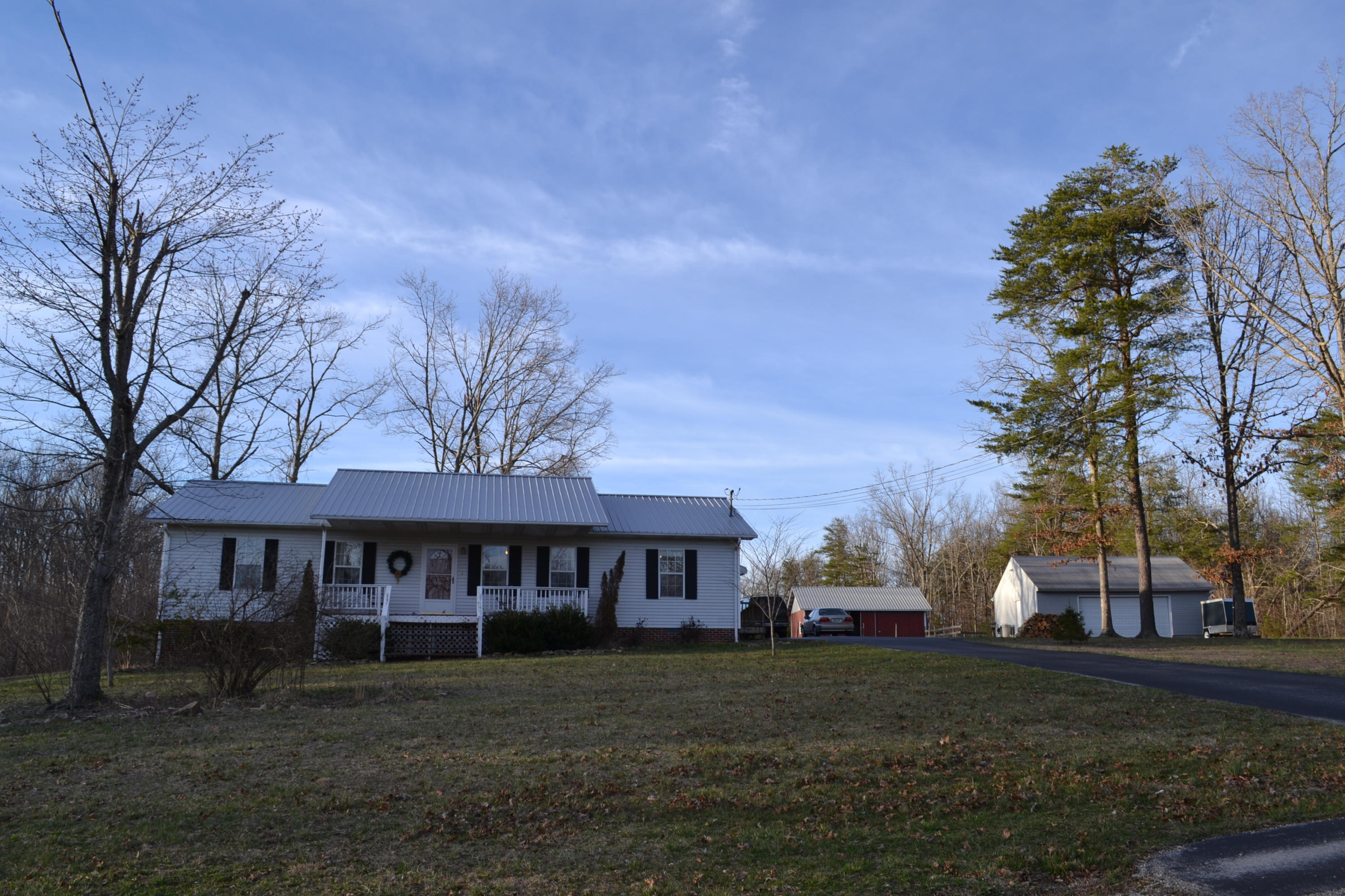 1009 Obed River Road Crossville, TN 38555 - Photo 4 of 24 4 View of house, detached, and barn.JPG