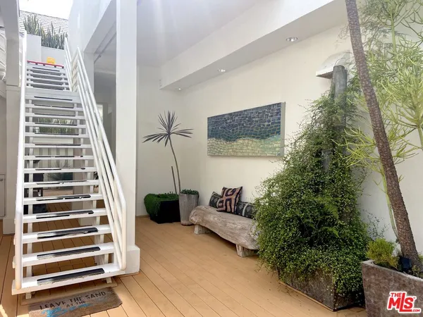 a view of entryway with stairs