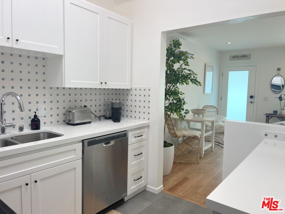 25366 Malibu Road, Unit 2 Malibu, CA 90265 - Photo 10 of 25 a kitchen with sink and cabinets