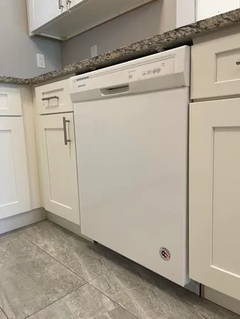 a view of a utility room with washer and dryer