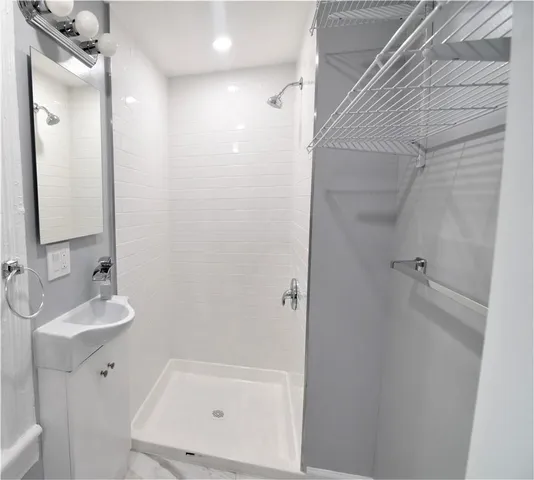 a bathroom with a bathtub and a sink