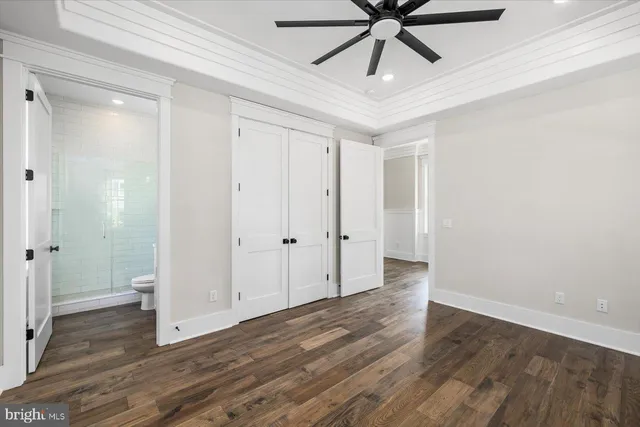a kitchen with stainless steel appliances kitchen island a refrigerator sink and stove