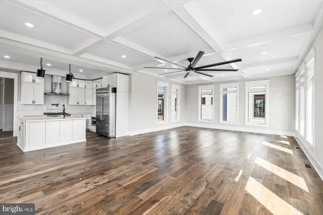 a bathroom with a sink a mirror and a shower