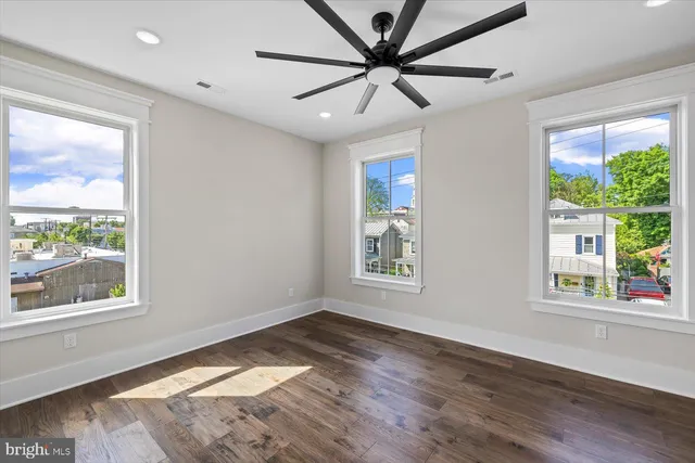 a bathroom with a bathtub and window