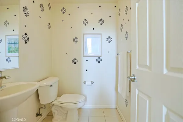 a work room with furniture and wooden floor