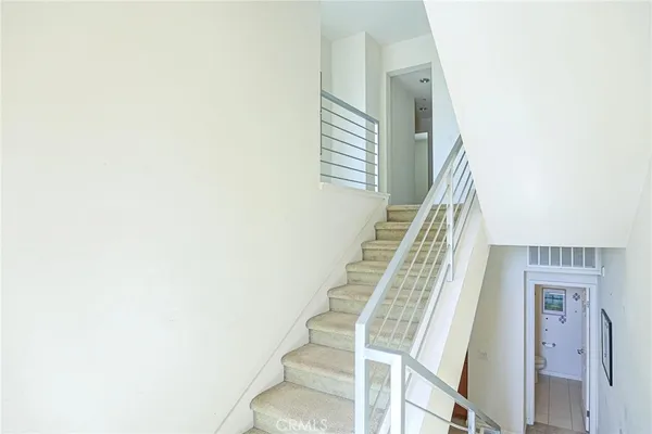 a workspace with furniture and a potted plant