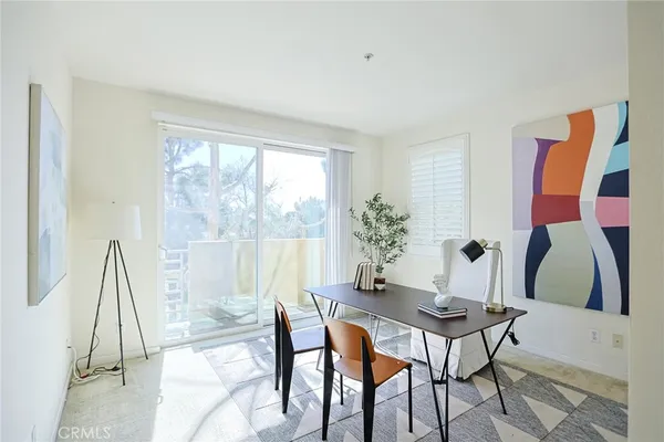 a view of an empty room with a bathroom