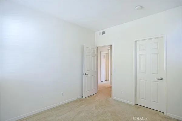 a bathroom with a bathtub sink and mirror