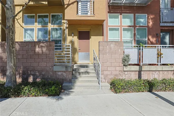 a bedroom with furniture and a fireplace