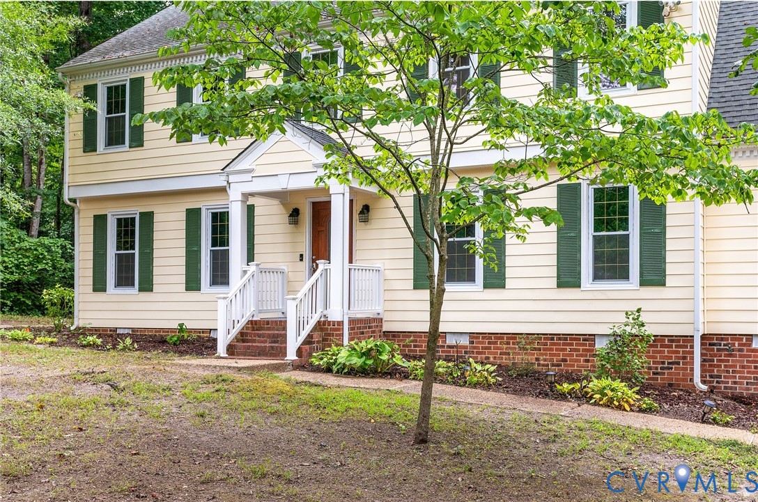 14305 Chimney House Road Midlothian, VA 23112 - Photo 3 of 49 a front view of a house with garden