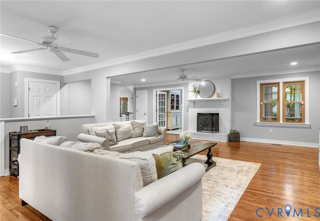 14305 Chimney House Road Midlothian, VA 23112 - Photo 7 of 49 a living room with furniture and a fireplace