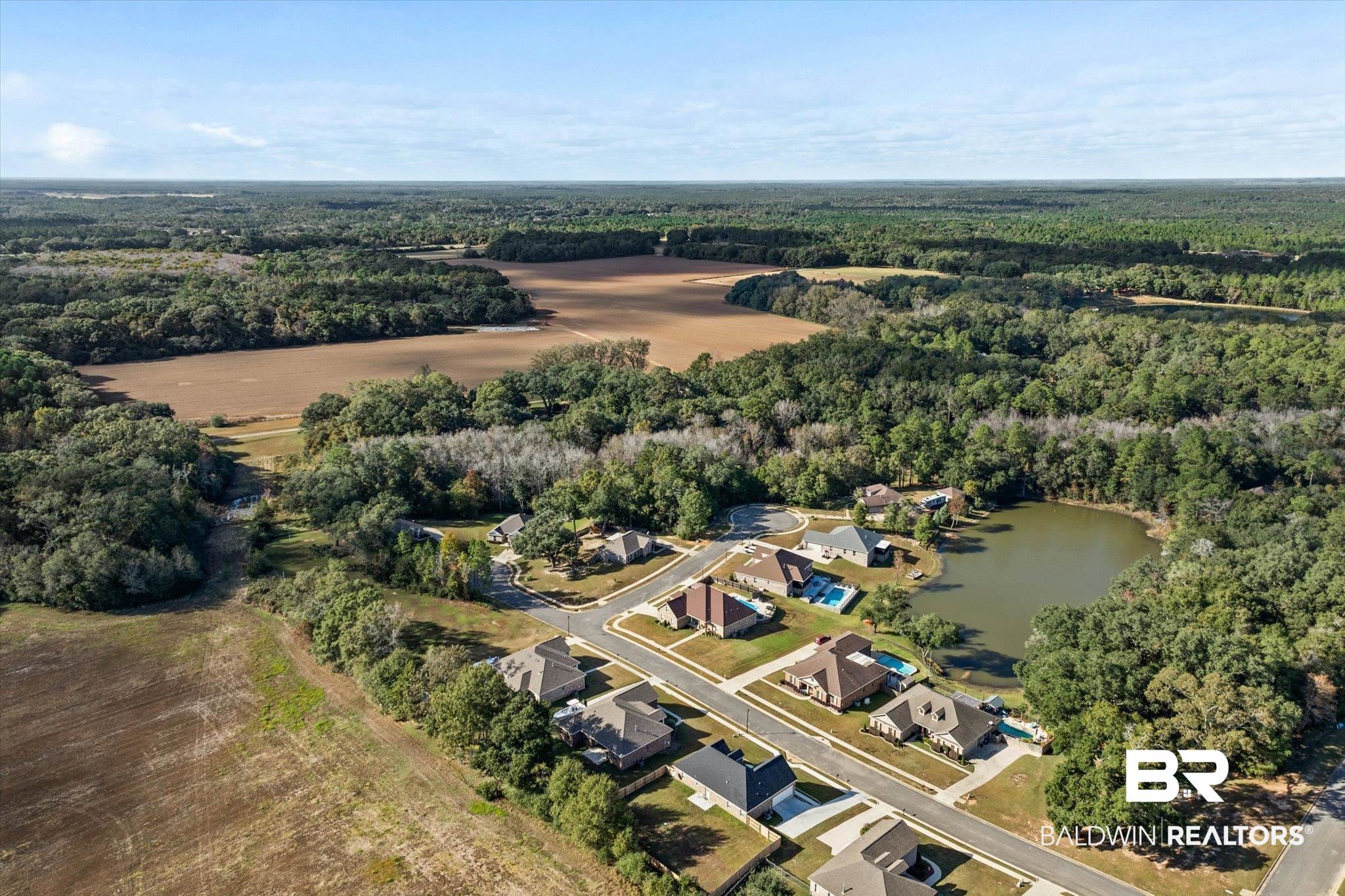 0 Acorn Way Grand Bay, AL 36541 - Photo 12 of 17 View of property location with a large body of water and nearby suburban area