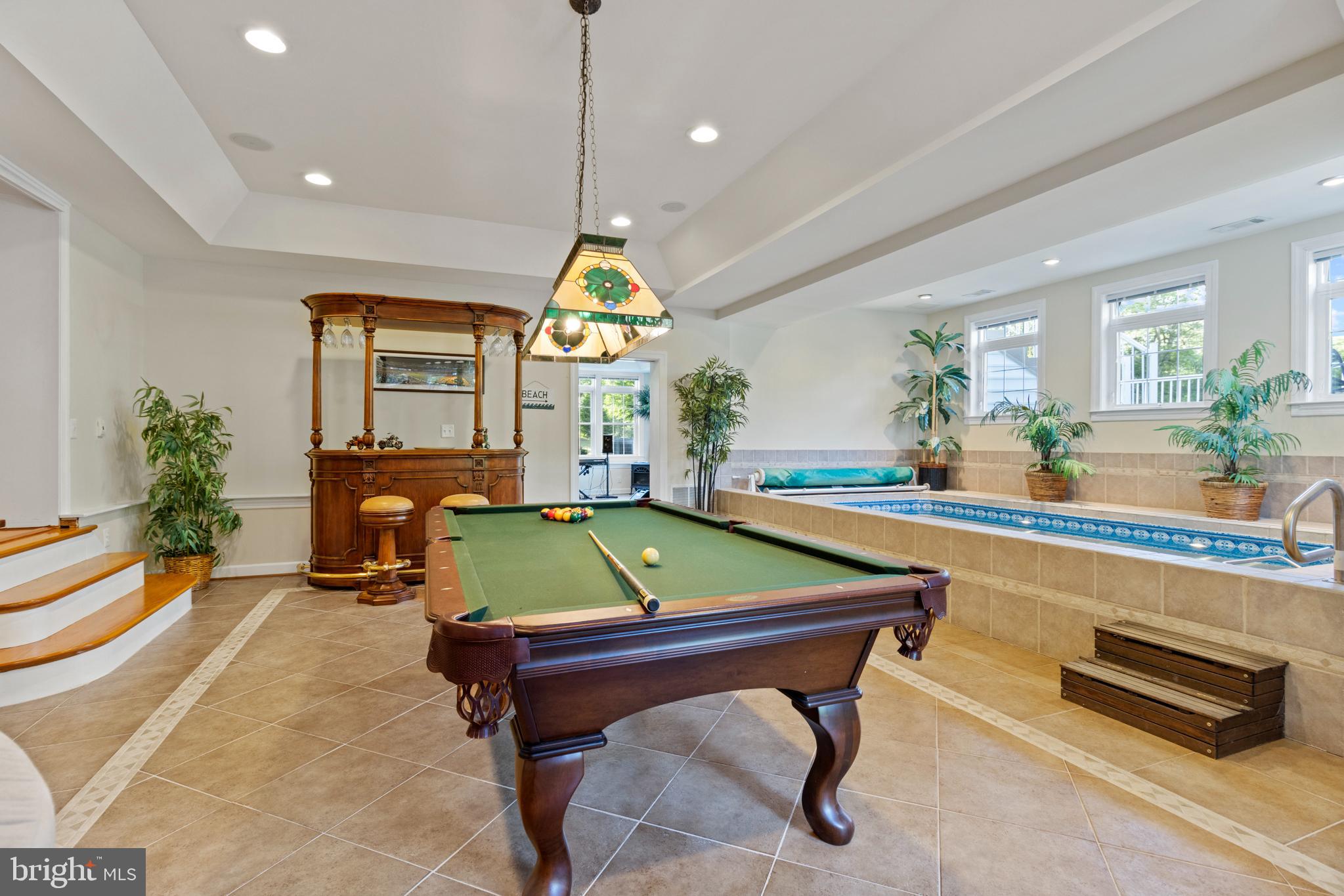 23703 Woodfield Road Gaithersburg, MD 20882 - Photo 14 of 97 Billiards area and indoor pool