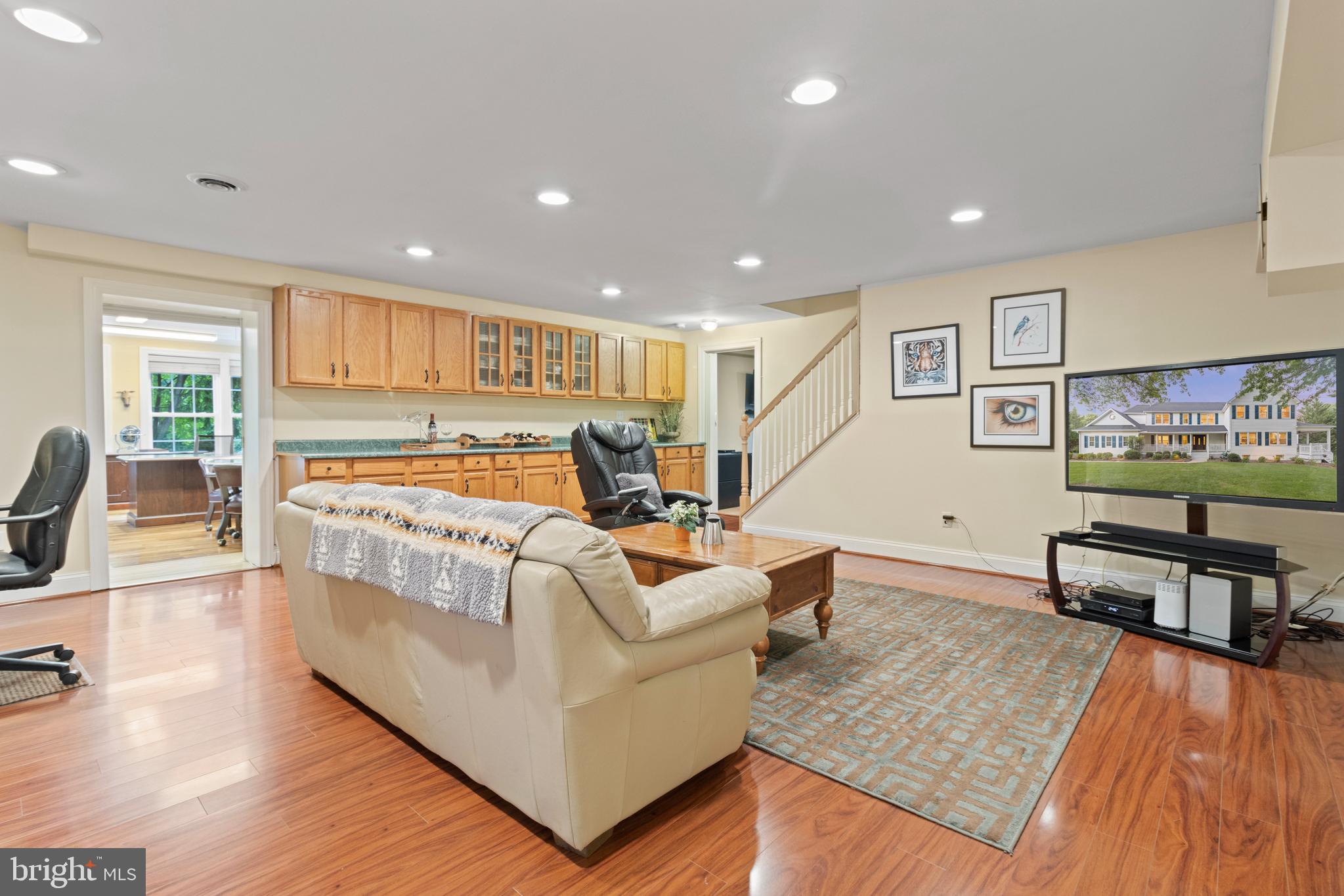 23703 Woodfield Road Gaithersburg, MD 20882 - Photo 64 of 97 Rec area with cabinets/dry bar