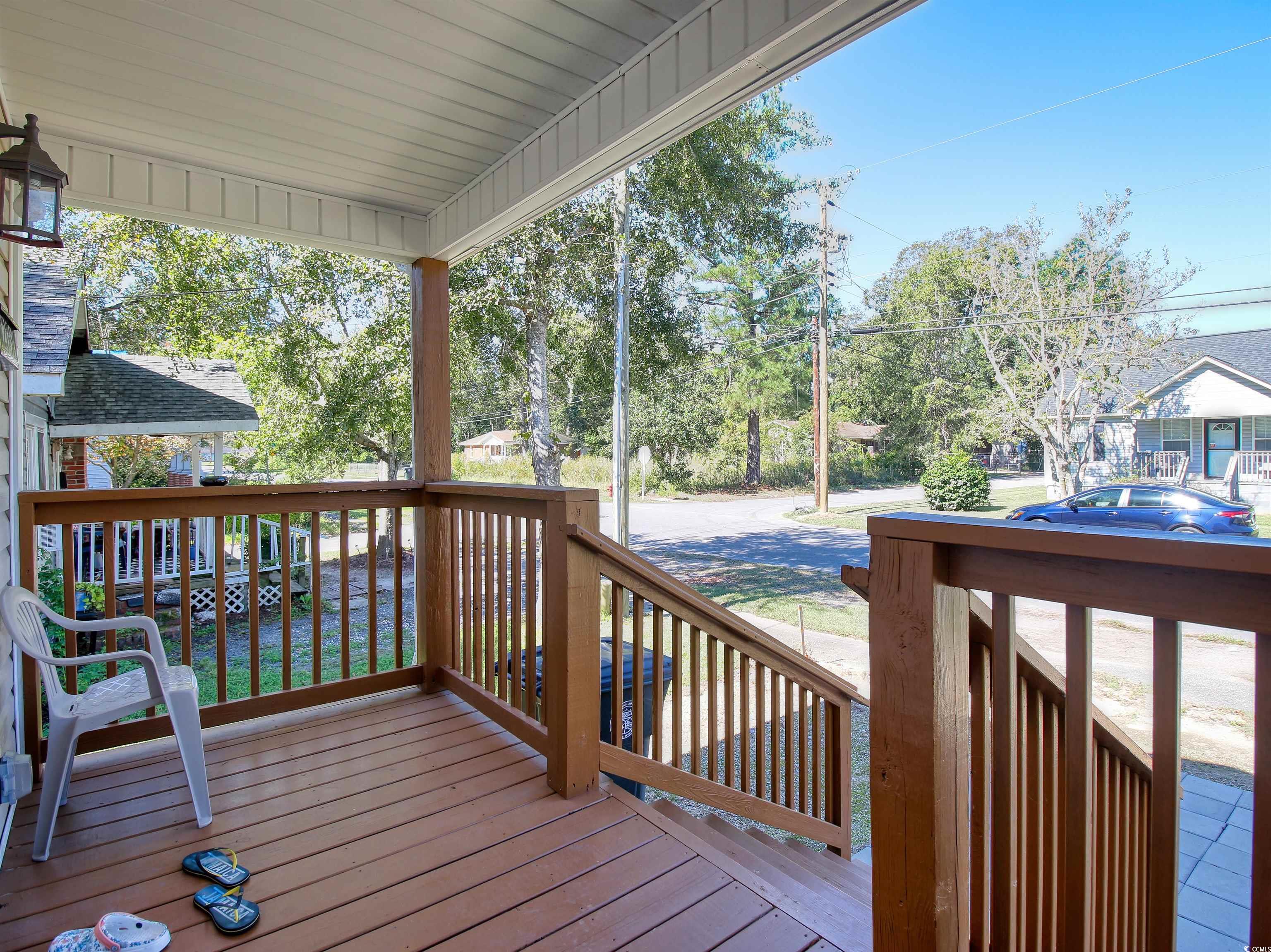 215 West James Street Mullins, SC 29574 - Photo 18 of 18 View of wooden porch