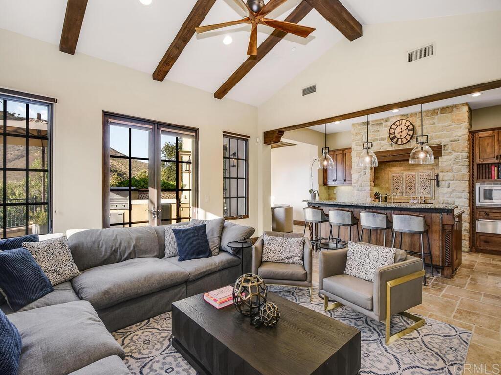 4272 Via Ravello Rancho Santa Fe, CA 92091 - Photo 28 of 58 a living room with furniture and a large window