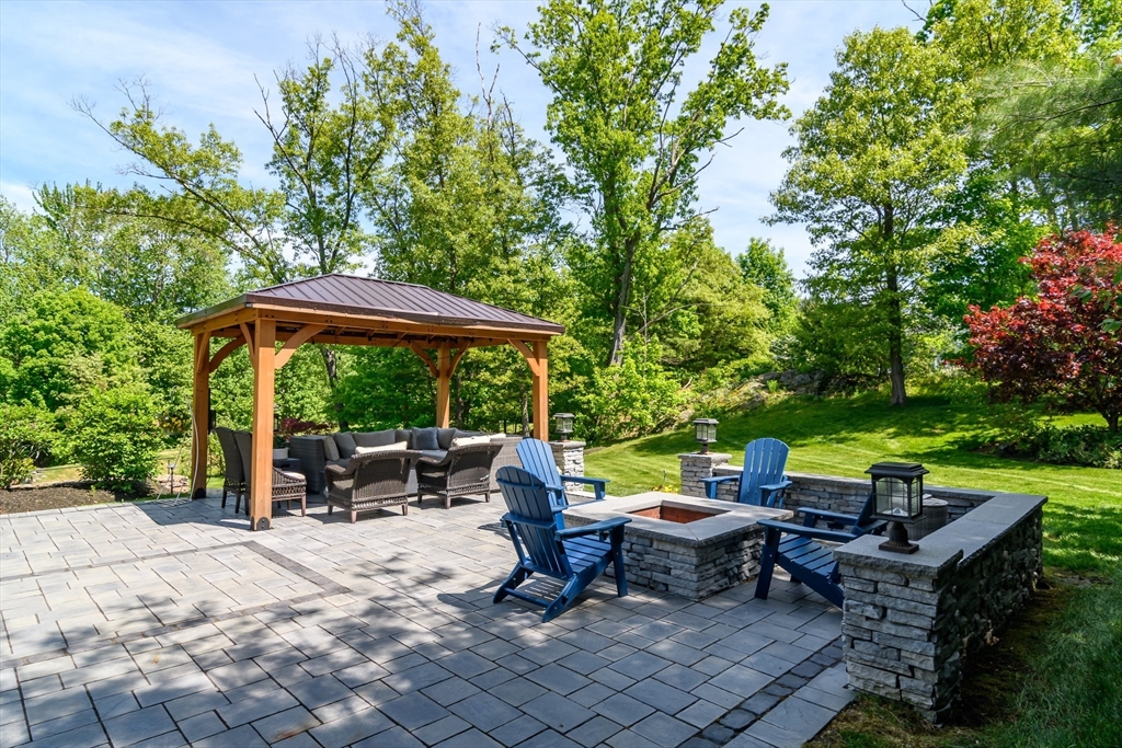 2 Hunters Lane Natick, MA 01760 - Photo 37 of 40 an outdoor space with furniture and garden view