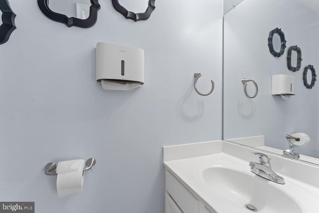 10335 Citation Way Ruther Glen, VA 22546 - Photo 15 of 47 a bathroom with a sink and mirror