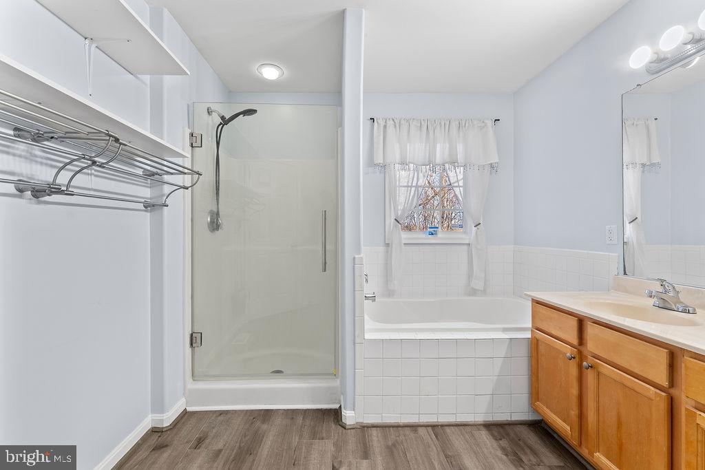 10335 Citation Way Ruther Glen, VA 22546 - Photo 20 of 47 a bathroom with a bathtub and a shower