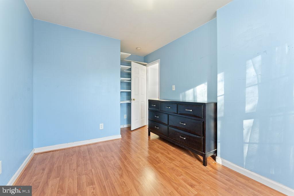 10335 Citation Way Ruther Glen, VA 22546 - Photo 23 of 47 a view of room with wooden floor