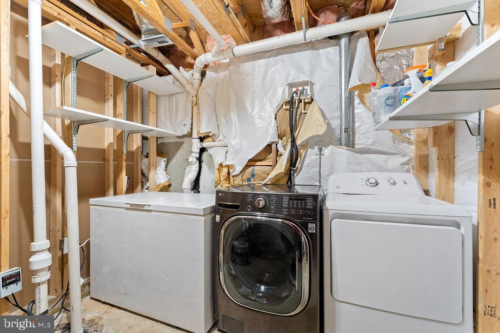 10335 Citation Way Ruther Glen, VA 22546 - Photo 35 of 47 a utility room with dryer and washer