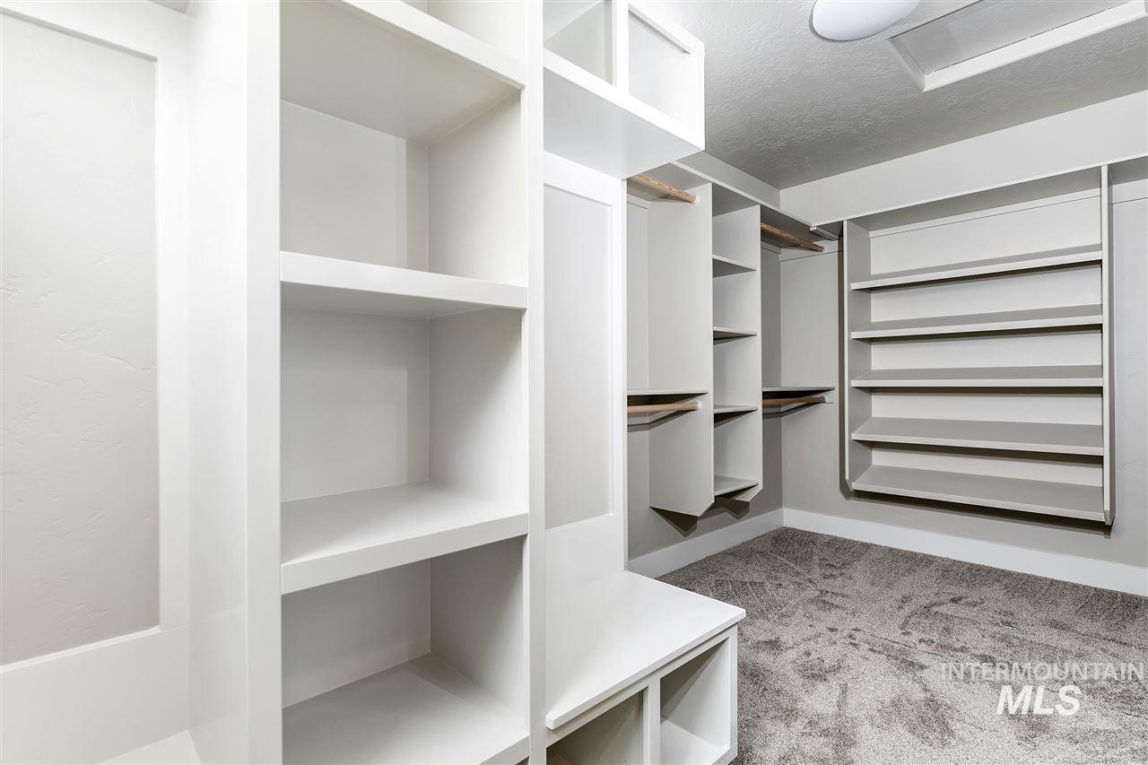 1166 West Recess Way Kuna, ID 83634 - Photo 2 of 2 Walk in closet featuring light carpet