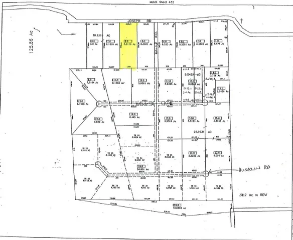 a picture of a bathroom with a shower and a window