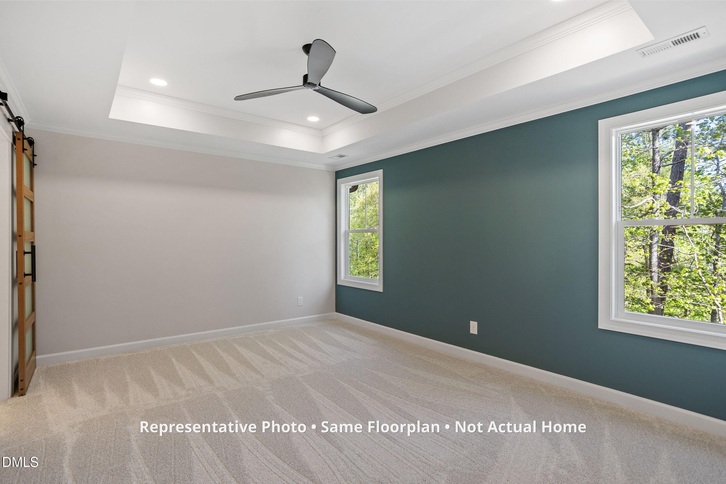 931 Woodland Road Creedmoor, NC 27522 - Photo 15 of 45 a view of an empty room with a window