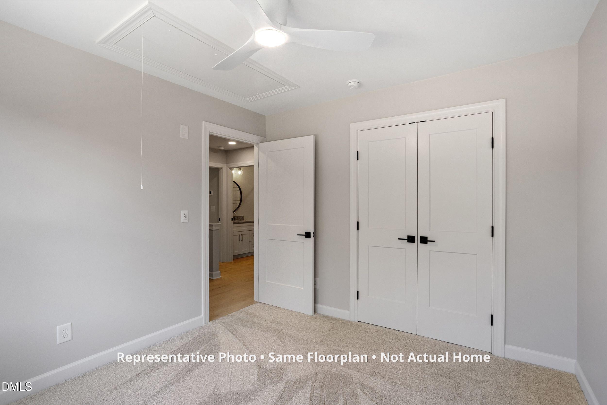 931 Woodland Road Creedmoor, NC 27522 - Photo 24 of 45 a view of an empty room