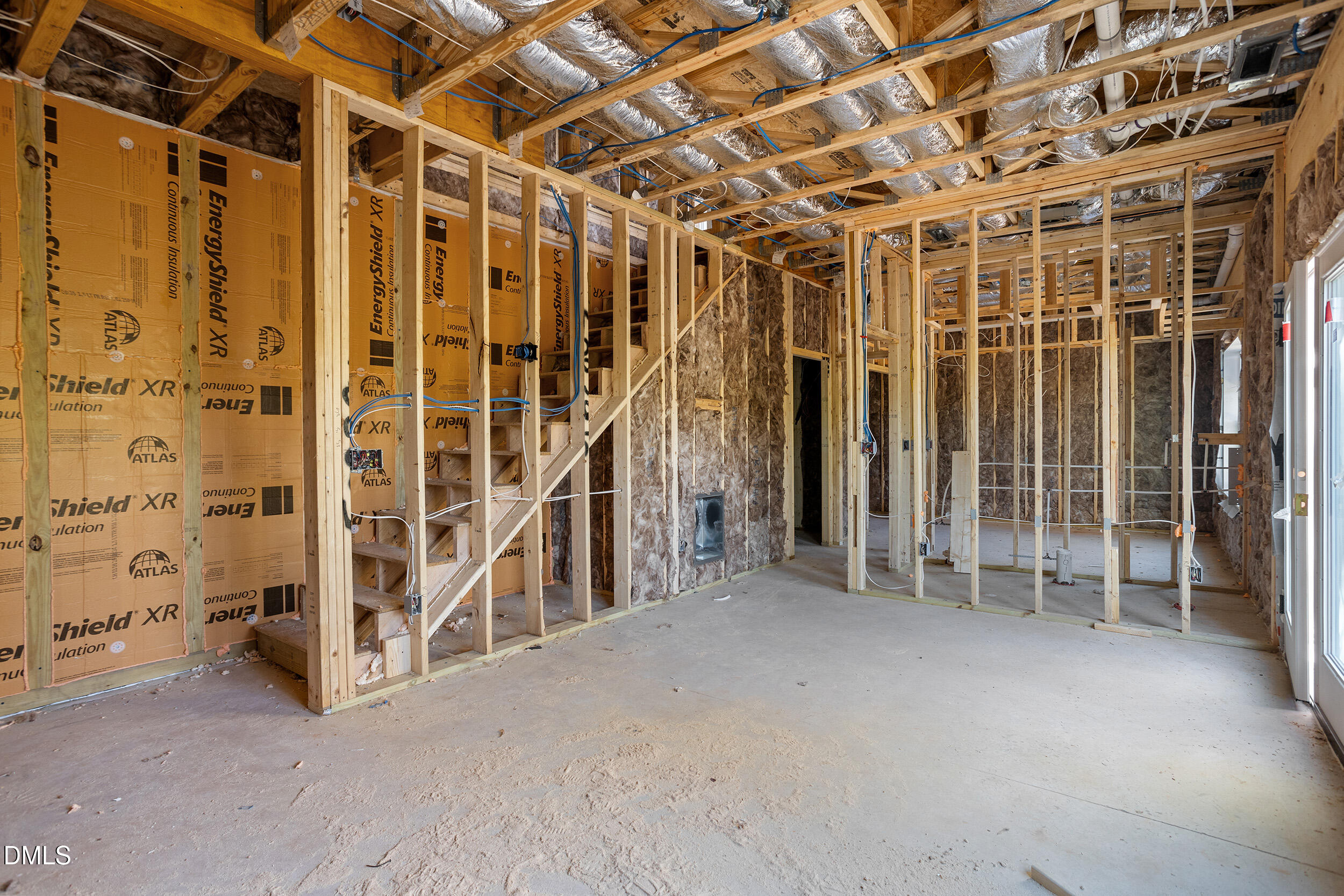 931 Woodland Road Creedmoor, NC 27522 - Photo 34 of 45 a view of an empty room with wooden walls