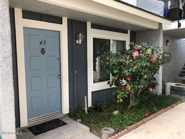 561 Spring Road, Unit 43 Moorpark, CA 93021 - Photo 1 of 8 front view of a house and a window